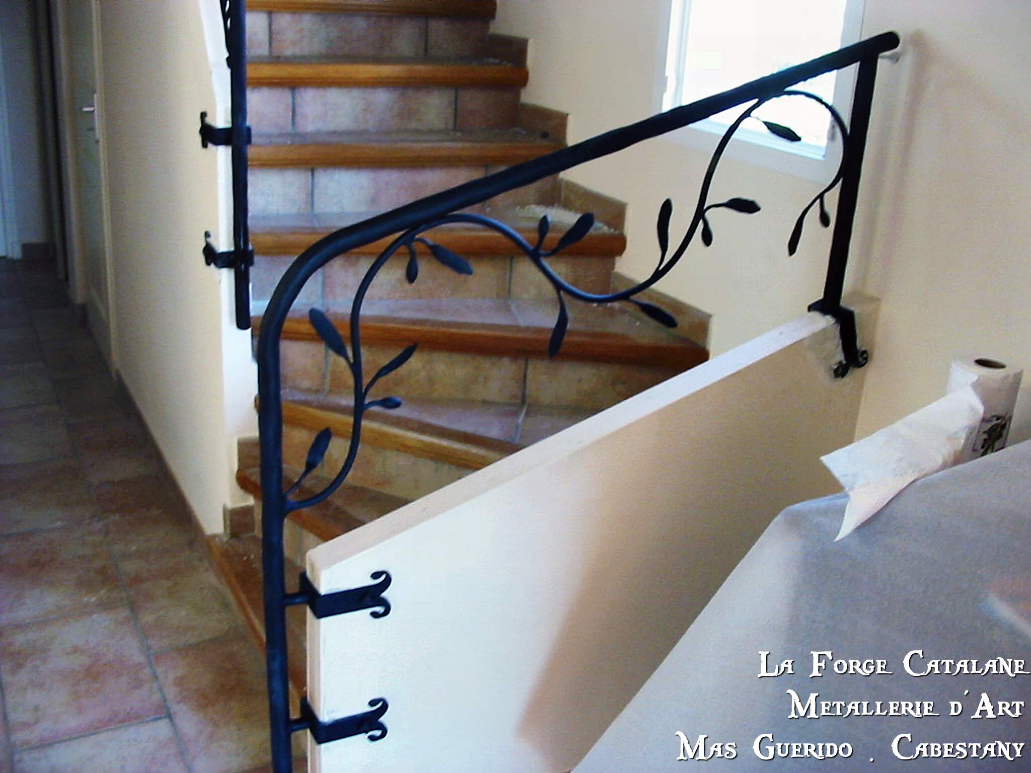 Rampant rameau olivier fixation ouvrage forge catalane.jpg